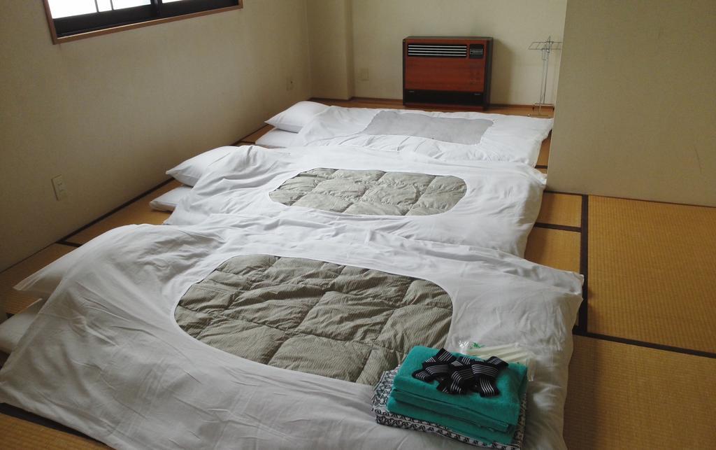 Hakuba Glad Inn Ebisuya Buitenkant foto